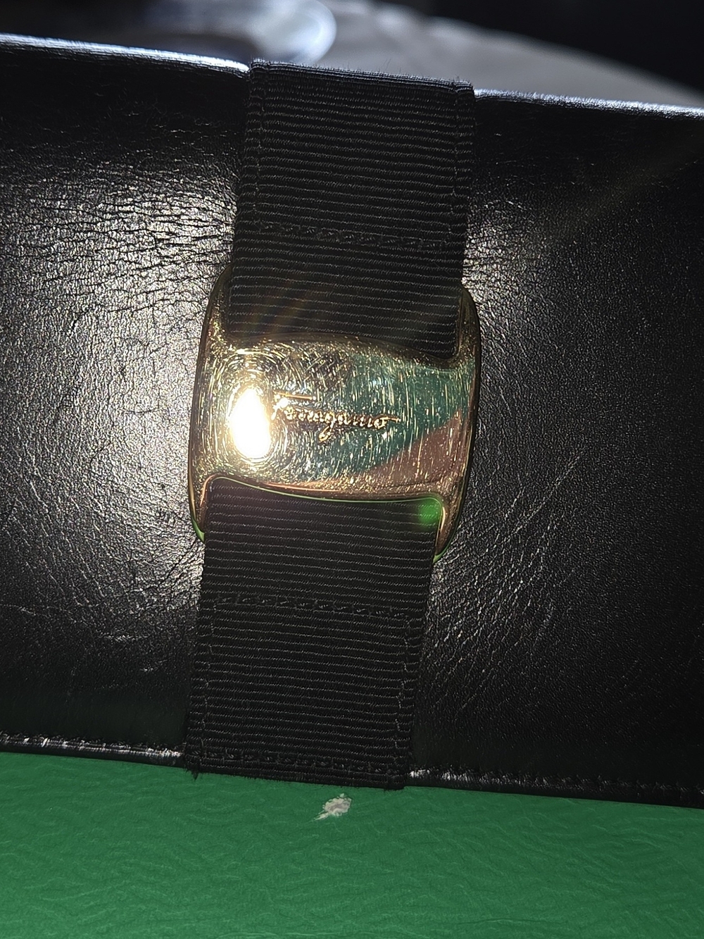 Salvatore Ferragamo Black Leather Clutch with Gold Buckle and Grosgrain Band